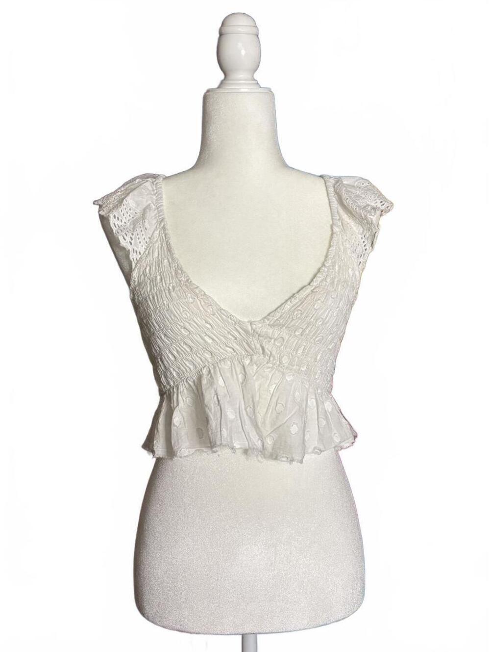 Urban Outfitters white ruffle blouse with small polka dots